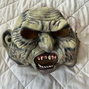 Scary Halloween mask with creepy pony tail